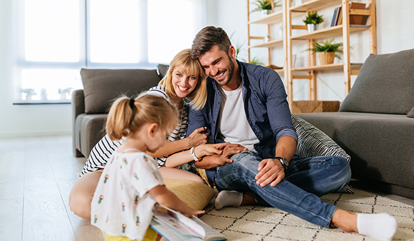 Family in the living room happy